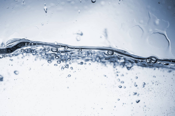 Water splashes with bubbles.  - Valokuva, kuva