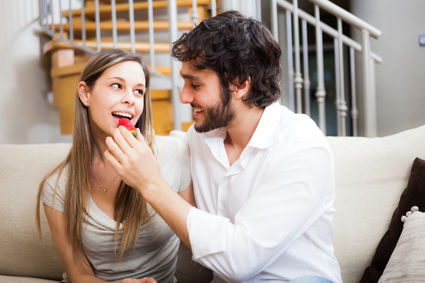 Couple eating strawberries - Photo, Image