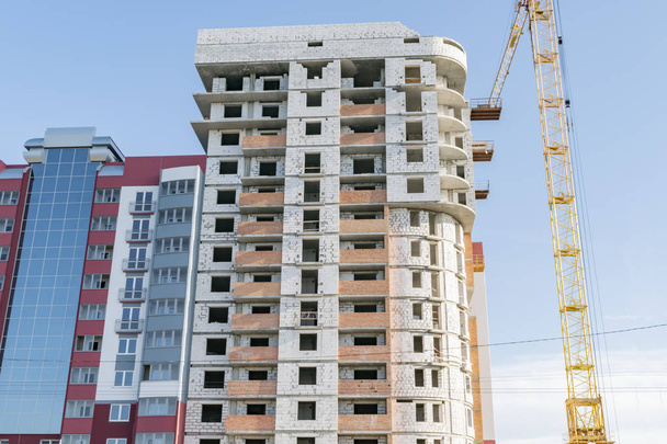 Construction of a new multi-storey building in the city - Фото, зображення