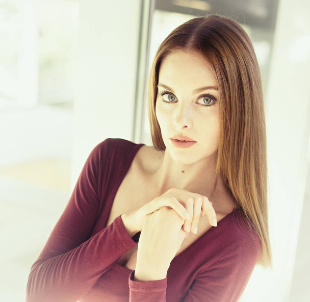 Beautiful model with red hair and blue eyes. - Foto, Imagen