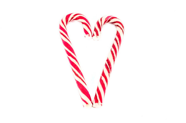Kerstmis candy canes op witte achtergrond - Foto, afbeelding