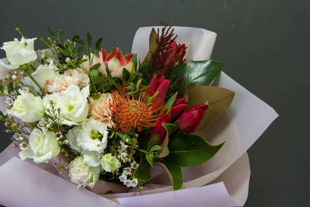 The original bouquet in vintage style on a dark background, selective focus - Photo, Image