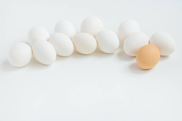 Group of white eggs on white background. Getting ready for the Easter holiday. - Photo, image