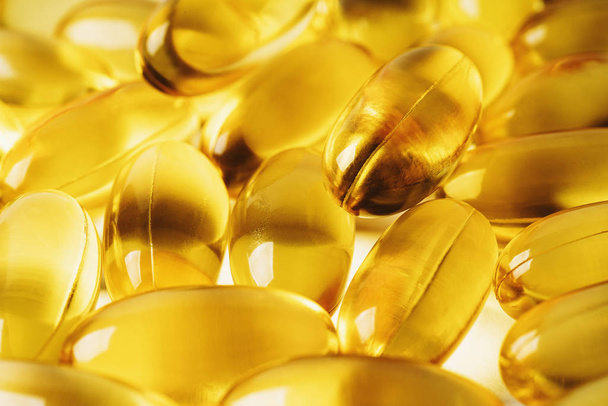 Omega 3 vitamin supplement gel capsules or Fish Oil, Cod liver oil medicines, macro photo - Foto, afbeelding