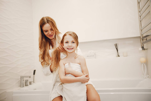 mother with cute blond daughter - Photo, image