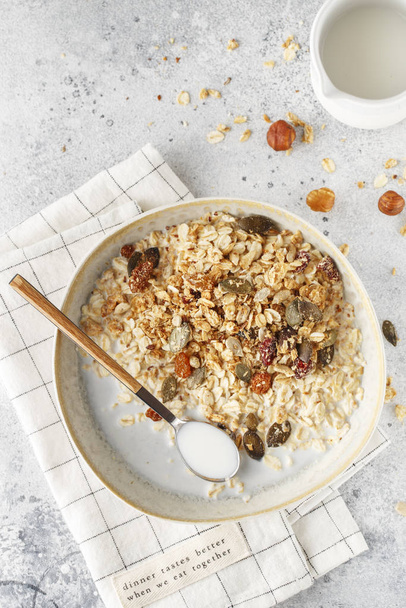 Organic homemade granola cereal with oats, nuts and dried berrie - Photo, Image