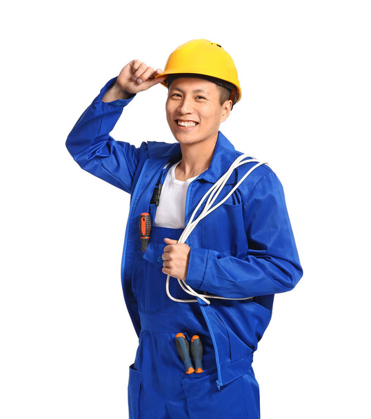Handsome Asian worker on white background - 写真・画像