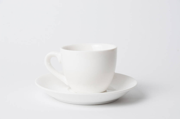 Valkoinen espresso kahvikuppi eristetty valkoisella pohjalla
 - Valokuva, kuva