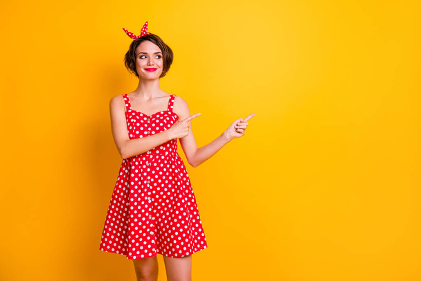 Attention summer sales discount. Positive cheerful girl promoter point index finger copyspace indicate adverts promo wear stylish outfit isolated shine color background - 写真・画像