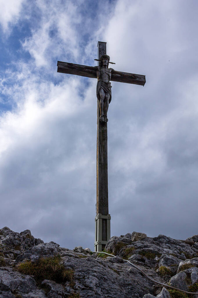 Summit Cross on top of the Mount Kofel, 1342 m in Ammergauer Alps, Ostalpen, located in Oberammergau, Upper Bavaria, Germany - Фото, зображення