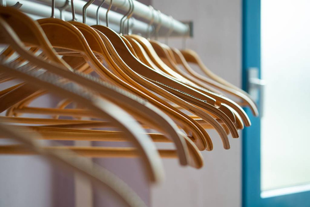 A closeup shot of cloth hangers on a blurred background - Photo, Image