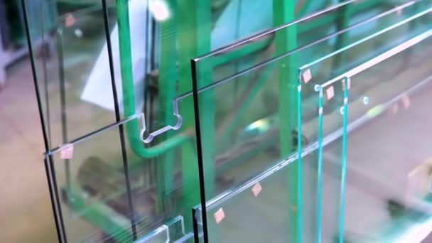 Sheets of Factory manufacturing tempered clear float glass panels cut to size - Footage, Video