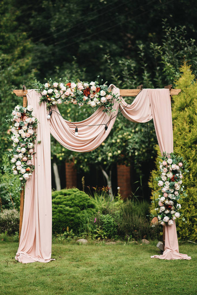 Arch for the wedding ceremony. Arch, decorated with beautiful fr - 写真・画像