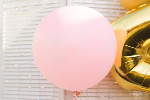 Large pink balloon on light background, holiday concept - Photo, Image