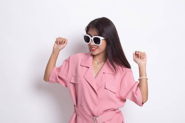 Portrait of a beautiful young asian girl in sunglasses. - 写真・画像