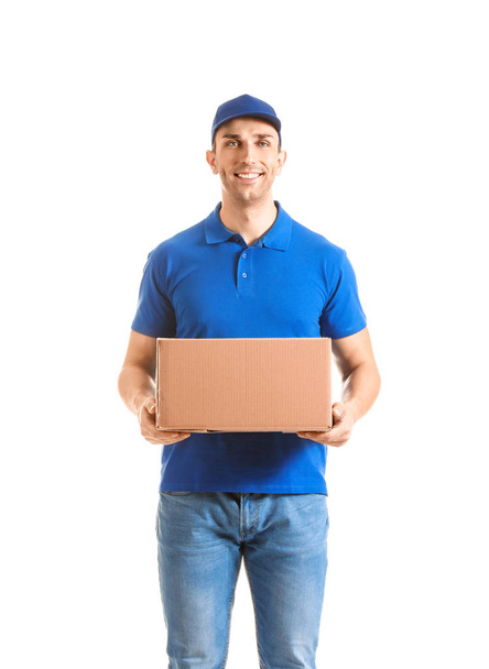 Delivery man with box on white background - Foto, afbeelding