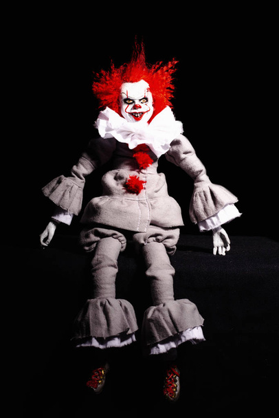 scary clown killer on a black background. horror. Halloween conc - Photo, Image