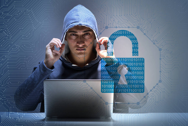 Young hacker in cybersecurty concept - Foto, afbeelding