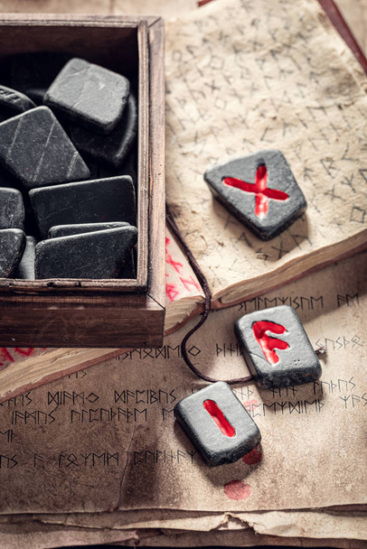 Old divination by rune stones based on futhark alphabet - Foto, Bild