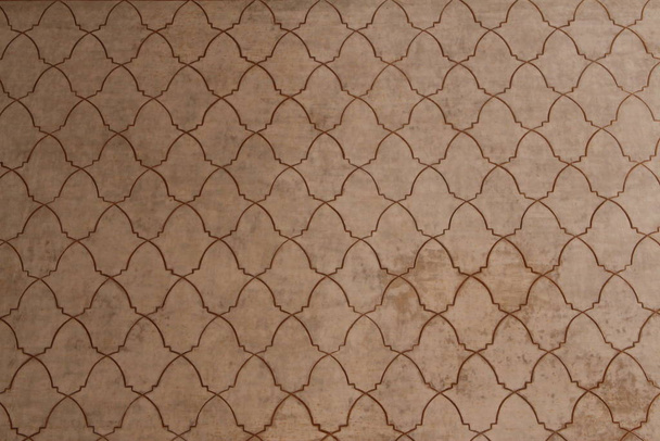 Historical Arabic wall pattern at Nasrid Palaces (Palacios Nazaries) at Alhambra Palace and fortress complex in Granada, Andalusia, Spain. - Foto, Imagem