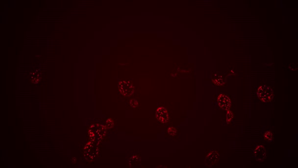 Abstracte beelden van bloederige rode deeltjes die over een donkere achtergrond vallen. - Video