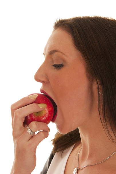 Girl bites in red apple - Photo, Image
