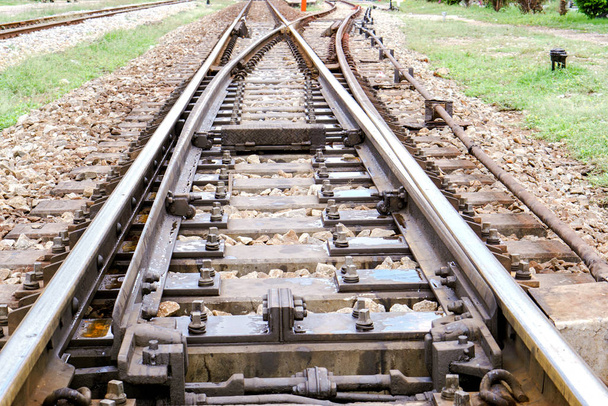 Close up of Metal and Stoneware railroad with a bifurcation crossing. - Photo, Image
