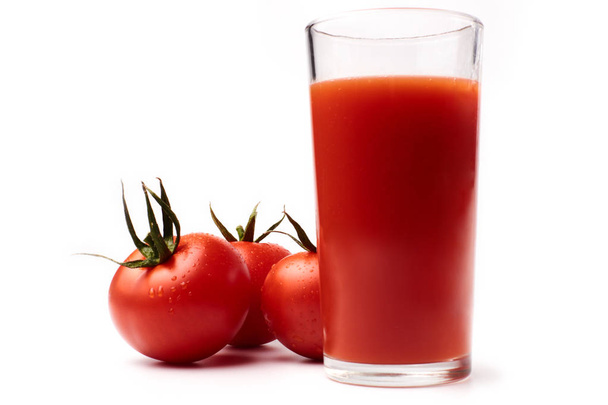 tomato juice in glass and tomatoes isolated on white background - Photo, Image