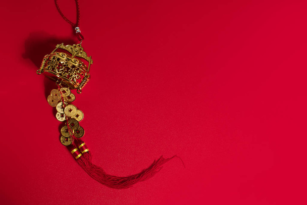 chinese happy new year holiday season greeting festival red background with gold luxury vintage oriental native hanging docoration, traditional happiness event concept - Foto, afbeelding