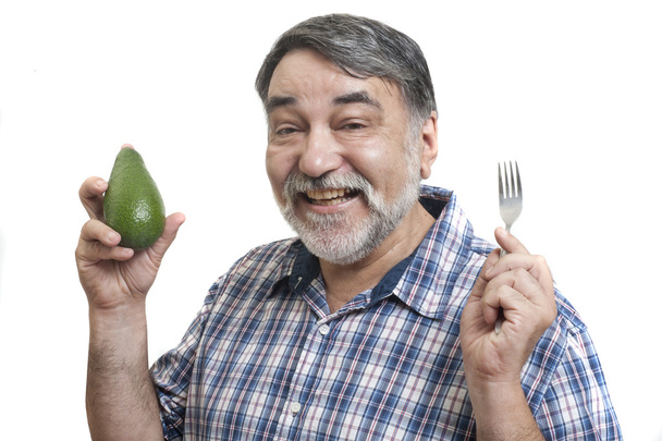 Ember eszik avokádó - Fotó, kép