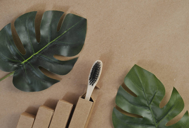 Bamboo toothbrushes on craft paper. Eco concept. Zero waste. - Photo, image