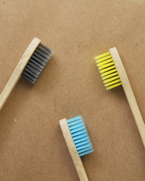 Bamboo toothbrushes on craft paper. Eco concept. Zero waste. - Photo, Image