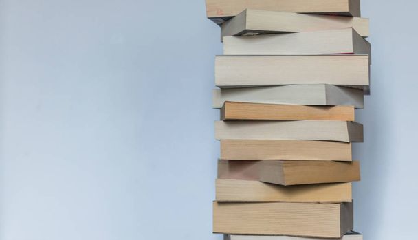 Stack of books on wooden background, knowledge and science  - Фото, зображення