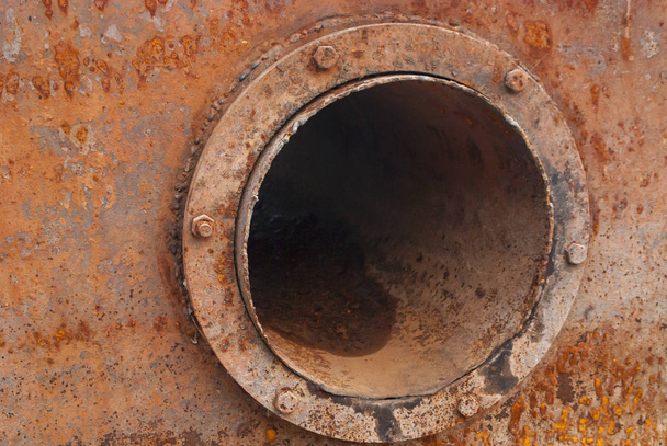 rusty pipe flange on an old barge - Fotó, kép