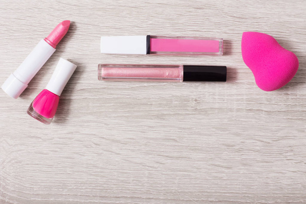 female pink cosmetics, top view - 写真・画像