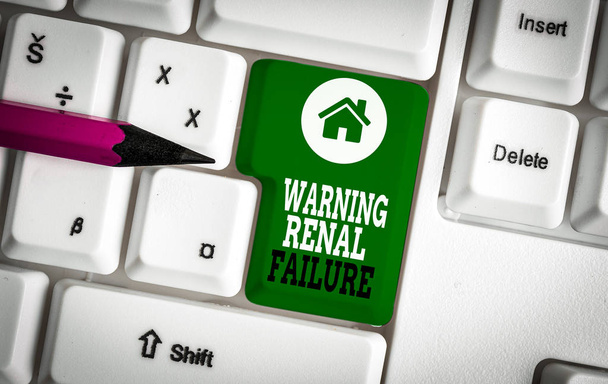Text sign showing Warning Renal Failure. Business photo showcasing stop Filtering Excess Waste Acute Kidney malfunction White pc keyboard with empty note paper above white background key copy space - Photo, Image