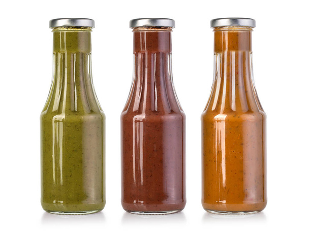 salsas de barbacoa en botellas de vidrio
  - Foto, Imagen