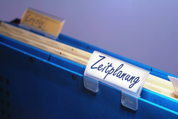 a close up image of blue plastic office supplies and documents - Φωτογραφία, εικόνα