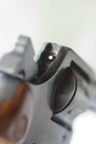 close up view of loaded revolver gun - Фото, изображение