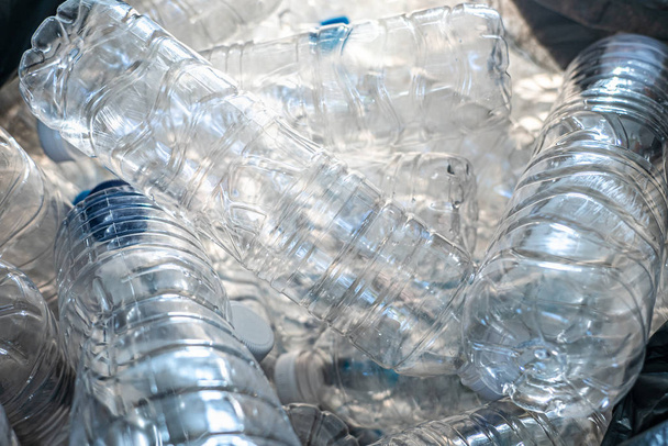 Closeup plastic bottles in trash bag, Global warming concept - Photo, Image