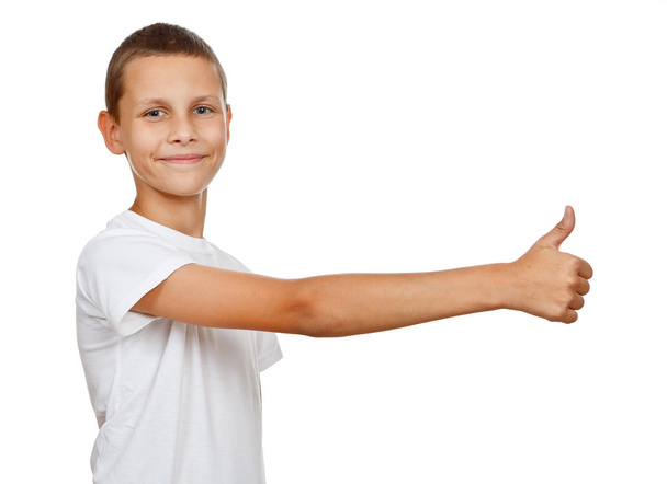 Boy showing thumb up - Фото, зображення