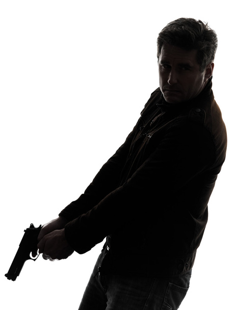 man killer policeman holding gun silhouette - Фото, зображення