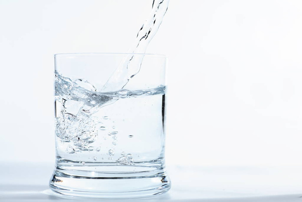 glass of water with ice cubes - Φωτογραφία, εικόνα