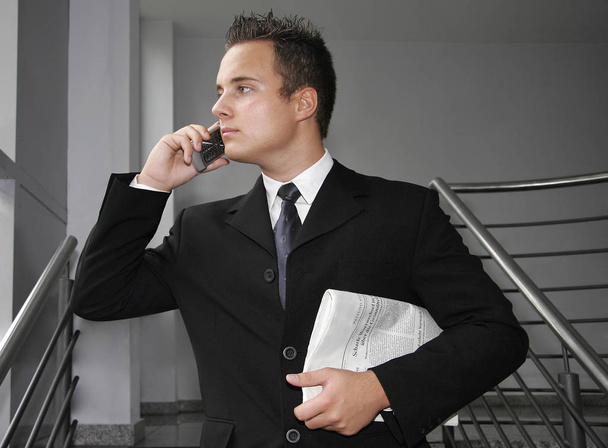 businessman talking on mobile phone, business dealings and labor - Foto, afbeelding