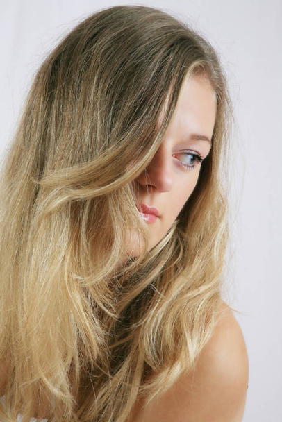 portrait of a beautiful blonde woman with long hair - Foto, imagen