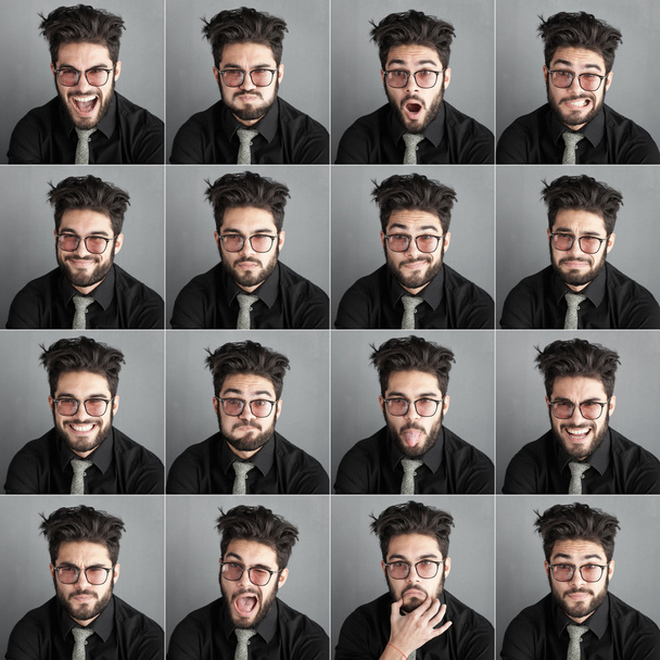 Набір виразів красивого чоловіка з окулярами та бородою на фоні темної стіни
 - Фото, зображення