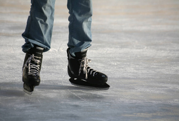 skating skaters on an ice surface - 写真・画像