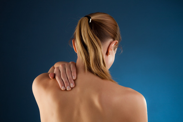 Woman massaging pain back - Fotografie, Obrázek