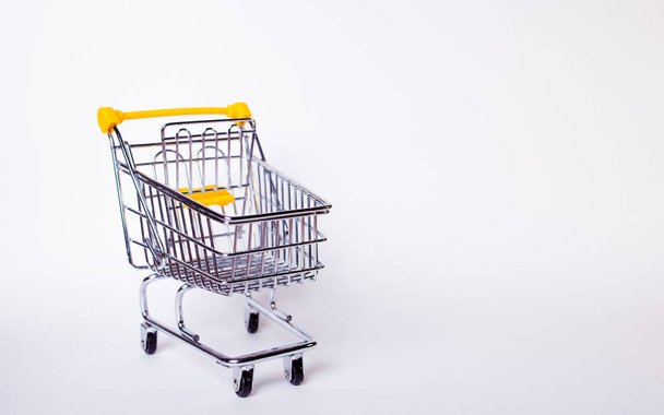 Shopping cart concept of shopping and sales, retail and shops. - Valokuva, kuva
