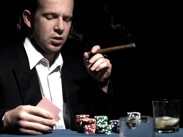 poker player playing with chips and cards - Foto, immagini